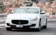2014-Maserati-Quattroporte-front-left-view-4.webp