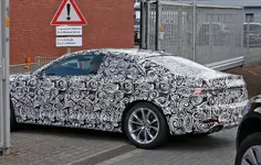 first-spy-photos-of-2017-audi-a5-coupe-show-wider-sexier-design_12.webp