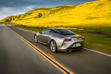 2018-Lexus-LC-500-rear-three-quarter-in-motion-01.webp