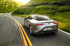 2018-Lexus-LC-500-rear-three-quarter-in-motion-02.webp