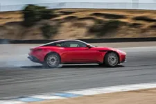 2017-Aston-Martin-DB11-side-in-motion-01.webp