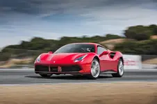 2016-Ferrari-488-GTB-front-three-quarter-in-motion-01.webp