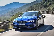 2018-BMW-M5-front-three-quarter-in-motion-09.webp