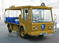 1200px-Milk_float_-_Liverpool_%28modified_background%29.webp