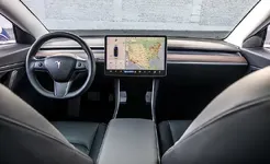 2018-tesla-model-3-inline1-photo-706223-s-original.webp