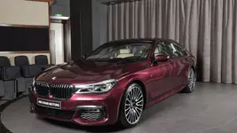bmw-7-series-with-wildberry-paint.webp