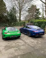blue-amg-gt-63-s-four-door-looks-good-next-to-green-amg-gt-r-coupe_1.webp