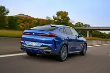 3-bmw-x6-m50i-2019-fd-hero-hero-rear.webp