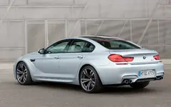 2014-BMW-M6-Gran-Coupe-rear-three-quarters-static-1440x900.webp