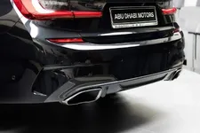 bmw-m340i-sapphire-black-with-blue-interior-12.webp