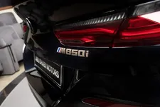 bmw-m850i-gran-coupe-carbon-black-metallic-10.webp