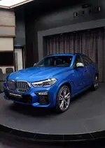 2020-bmw-x6-m50i-riverside-blue-abu-2.webp