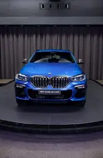 2020-bmw-x6-m50i-riverside-blue-abu-1.webp