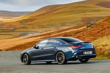 17-mercedes-amg-cla35-2020-uk-fd-cornering-rear.webp