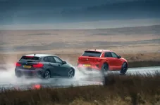 8_bmw_m135i_and_vw_t-roc_r_tracking_side.webp