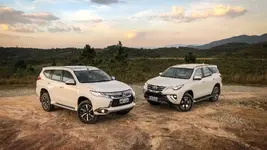 comparativo-mitsubishi-pajero-sport-x-toyota-hilux-sw4.webp