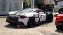 ferrari-v6-hybrid-supercar-spied-testing-alongside-sf90-stradale-sounds-throaty-thumbnail_3.webp