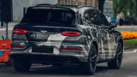 2021-bentley-bentayga-speed-teaser-rear-3-4.webp