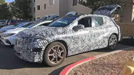 mercedes-benz-eqs-suv-side-view-spy-photo.webp