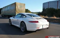 white_porsche_911_991_carrera_s_on_autobahn_a81_008.webp