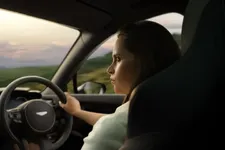 Felicity Jones behind the wheel of DBX707.webp