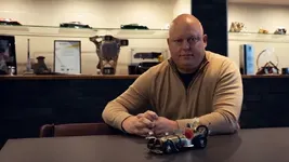 enigsegg-in-His-Office-With-Il-Tempo-Gigante-Model.webp