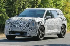 kia-ev9-front-side-driving_1.v1.webp