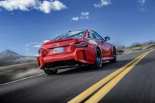 -new-bmw-m2-toronto-red-on-location-driving-2250px.webp