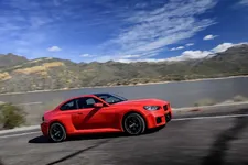-new-bmw-m2-toronto-red-on-location-driving-2249px.webp
