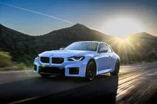 w-bmw-m2-zandvoort-blue-on-location-driving-2250px.webp