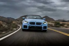 w-bmw-m2-zandvoort-blue-on-location-driving-2250px.webp