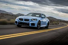 w-bmw-m2-zandvoort-blue-on-location-driving-2250px.webp