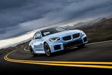 w-bmw-m2-zandvoort-blue-on-location-driving-2250px.webp
