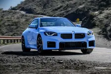 w-bmw-m2-zandvoort-blue-on-location-driving-2250px.webp