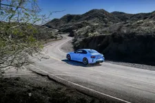 w-bmw-m2-zandvoort-blue-on-location-driving-2250px.webp