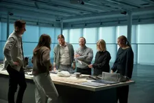 309922_Portion_of_the_team_behind_the_Volvo_EX90.webp