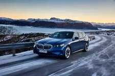 new-bmw-520d-xdrive-touring-driving-02-2024-2250px.webp