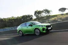 -m35i-xdrive-frozen-tampa-bay-green-driving-2248px.webp