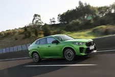 -m35i-xdrive-frozen-tampa-bay-green-driving-2248px.webp