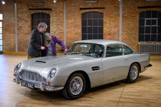 Mr-and-Mrs-Williams-at-the-unveiling-of-their-restored-DB5-Vantage.webp