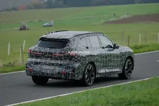 bmws-new-2028-x5-wears-neue-klasse-attire-beneath-trippy-vinyl-stickers_6.webp